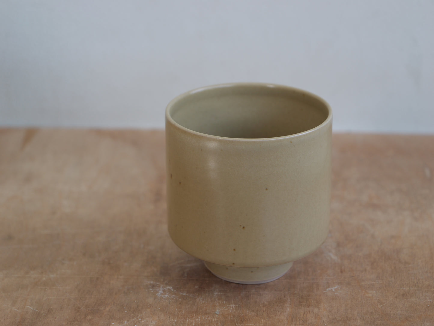 Beige footed cup