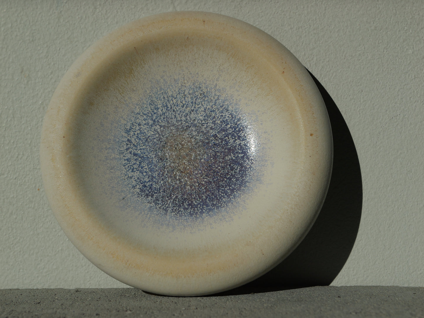 Small plate with purple-blue magic