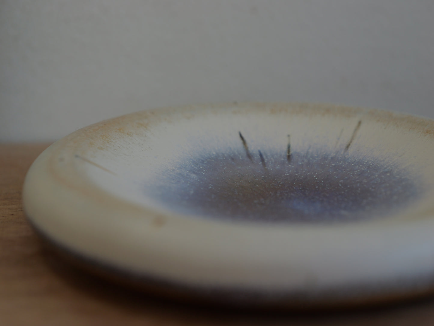Small plate with purple-blue magic