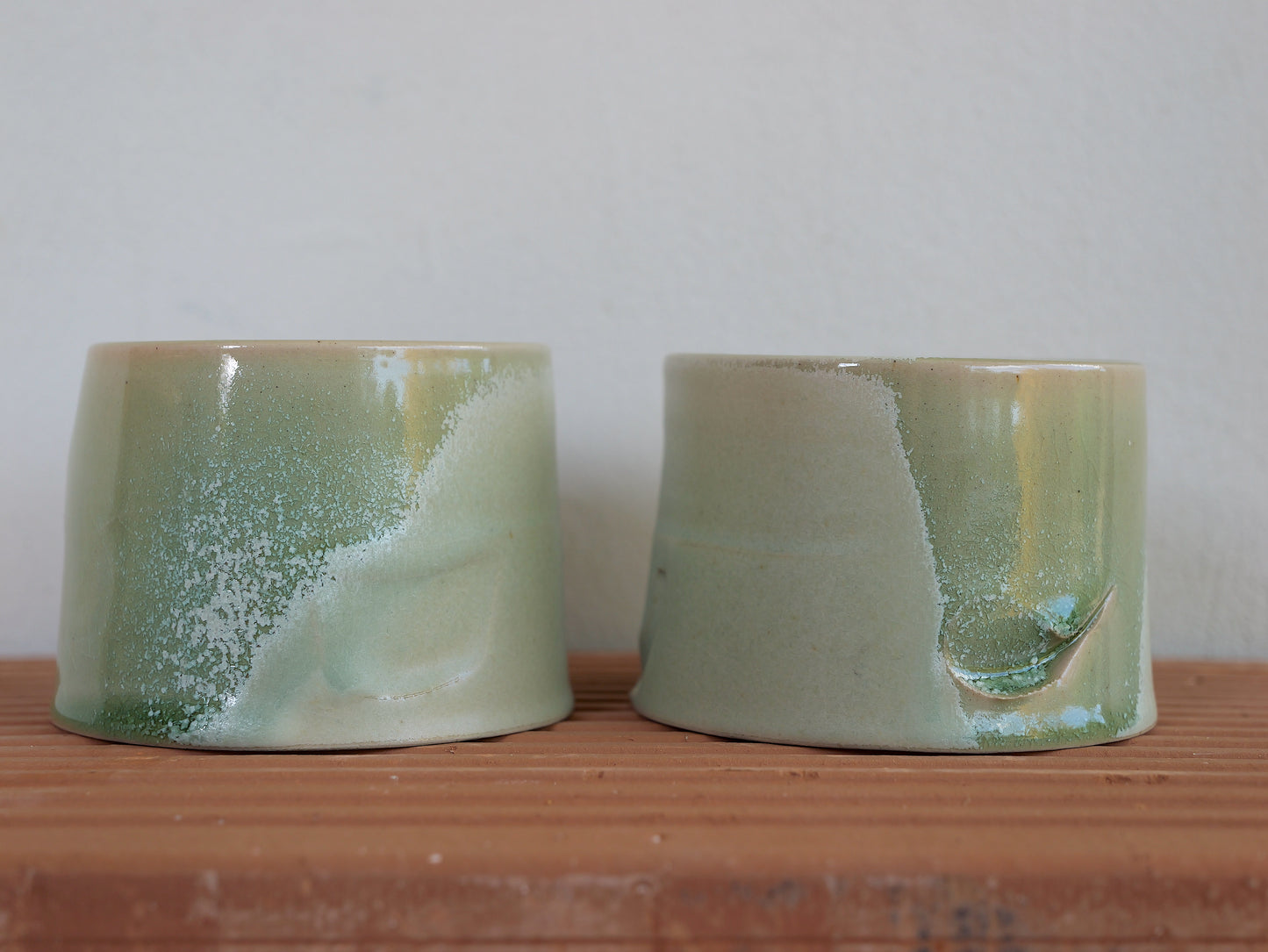 Set of two crystallised glossy green whiskey cups