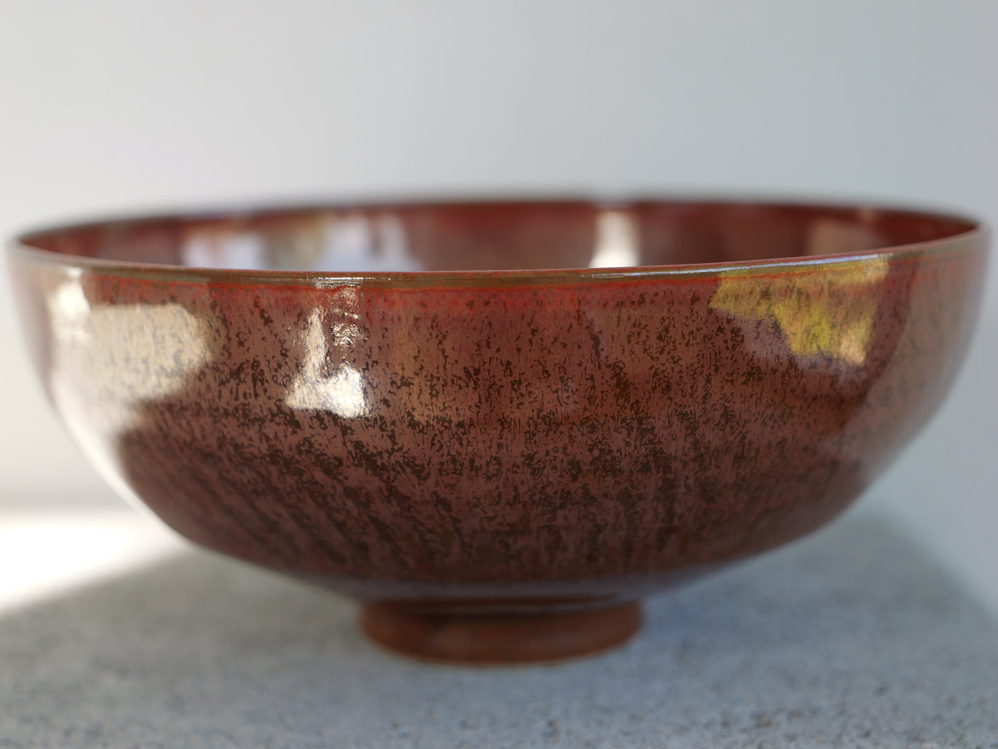 Red iron footed bowl