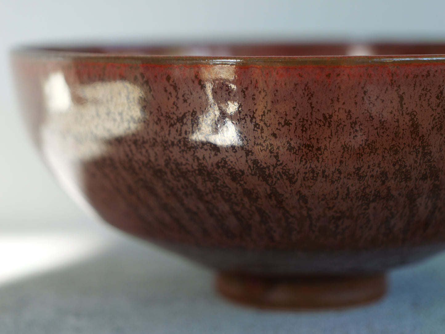 Red iron footed bowl