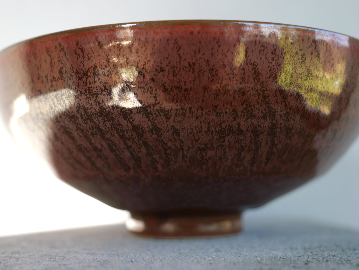Red iron footed bowl